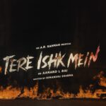 Tere Ishq Mein movie poster with burning fire background, bold distressed title text, and Colour Yellow Productions branding.
